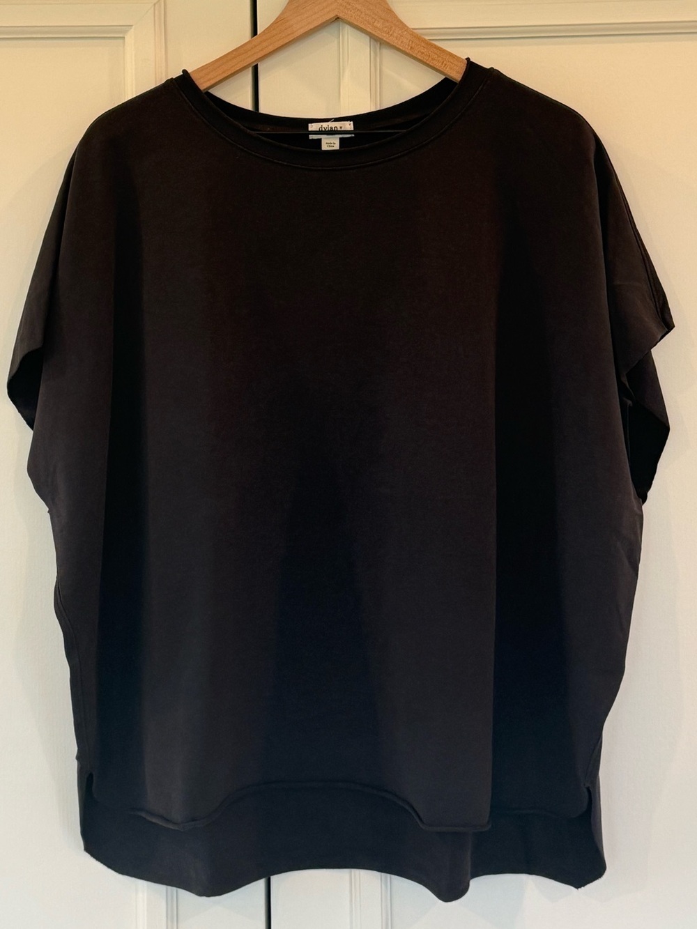 Dylan raw edge top in black, size S
